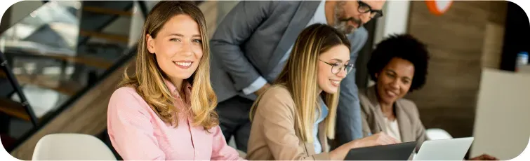 Accountants working together at desk — TPS Software guide